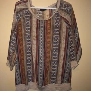 Sheer long sleeved native design top